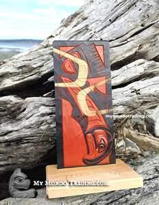 Salmon, cedar carving on wooden base, by Shane Flood Baker