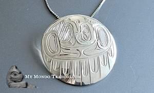 Circular 1 3/4" sterling silver Eagle pendant by Paddy Seaweed 