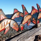 Killer Whale Family with Raven spirits and Baby Whales by Detreck George