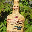 Early Nuu-chah-nulth Basket covered bottle